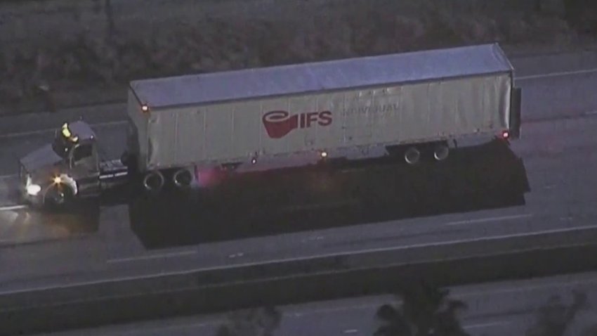 Officers chase a stolen big rig.