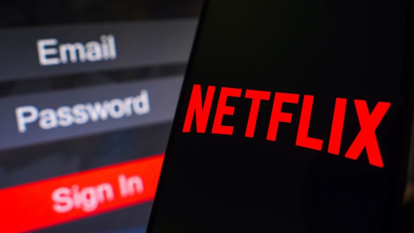 May 2, 2023, Brazil. In this photo illustration, the Netflix logo is displayed on a smartphone screen, next to a login screen, with email, password and sign in