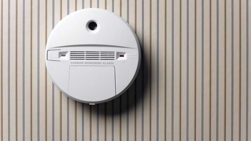 smoke detector and carbon monoxide alarm mounted on wall