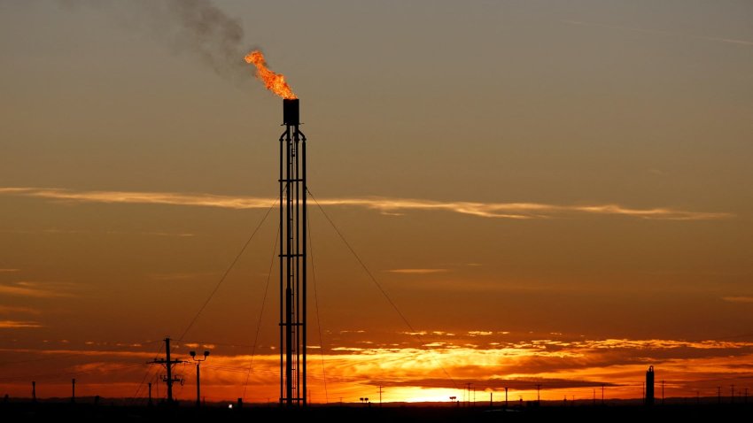 A flare burns excess natural gas in the Permian Basin in Loving County, Texas, U.S. November 23, 2019.
