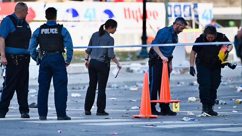 Police officers investigate the scene of a shooting where at least one person was killed and more than 20 others were injured after the Kansas City Chiefs’ Super Bowl LVIII victory parade on Feb. 14, 2024, in Kansas City, Missouri. (Tammy Ljungblad/The Kansas City Star/Tribune News Service via Getty Images)