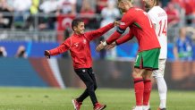 A fan is meeting Cristiano Ronaldo (POR) during the Turkiye vs Portugal match UEFA Euro 2024 in Dortmund, Germany, on June 22, 2024. (Photo by Foto Olimpik/NurPhoto via Getty Images)