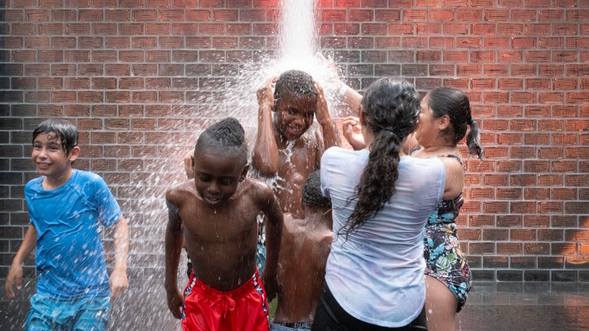 CHICAGO, ILLINOIS – JUNE 17: People cool off at Crown Fountain in Millennium Park as temperatures reached a record high of 97 degrees Fahrenheit on June 17, 2024 in Chicago, Illinois. Temperatures in the city are expected to reach highs in the 90s for the remainder of the week. (Photo by Scott Olson/Getty Images)