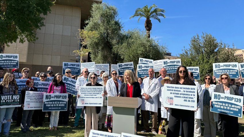 “It Goes Too Far,” the official campaign opposing Arizona’s abortion ballot measure, holds a press conference at the state Capitol on Oct. 30, 2024. (AP Photo/Sejal Govindarao)