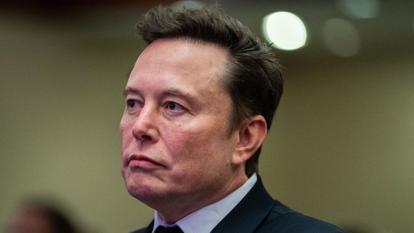 TOPSHOT – Elon Musk listens as US President-elect Donald Trump speaks during a meeting with House Republicans at the Hyatt Regency hotel in Washington, DC on November 13, 2024. (Photo by Allison ROBBERT / POOL / AFP) (Photo by ALLISON ROBBERT/POOL/AFP via Getty Images)