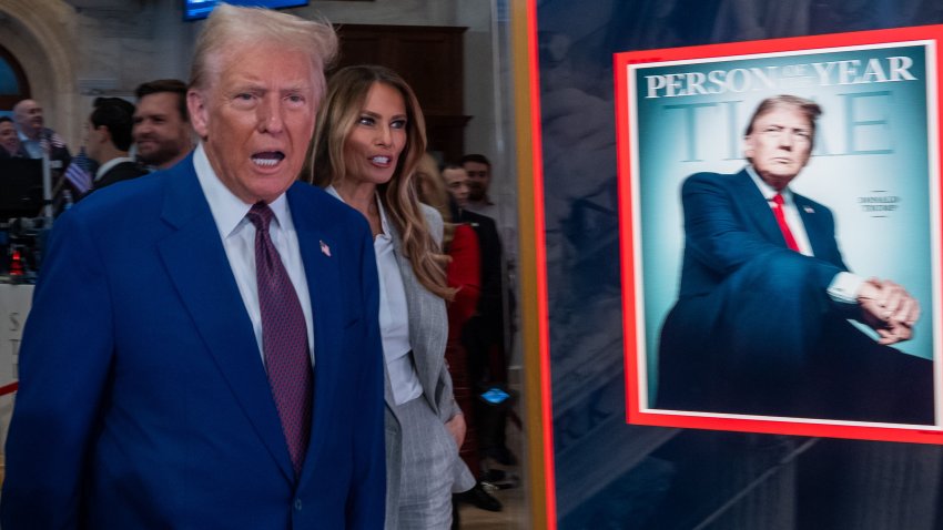 NEW YORK, NEW YORK – DECEMBER 12: President-elect Donald Trump walks onto the floor of the New York Stock Exchange (NYSE) with his wife Melania, after being named TIME‚Äôs ‚ÄúPerson of the Year‚Äù for the second time on December 12, 2024 in New York City. Trump attended a reception and rang the opening bell on the trading floor. (Photo by Spencer Platt/Getty Images)