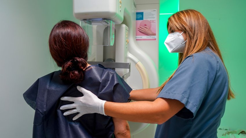 SEVILLE ANDALUSIA, SPAIN – OCTOBER 19: A lady with the help of a nurse gets a free mammogram at Quironsalud Infanta Luisa for the International Breast Cancer Day on October 19, 2021 in Seville, Andalusia.  The Quironsalud Infanta Luisa Hospital in Seville, offers the possibility of free mammograms to all women over 45 years old who have not passed a review in the last year. These tests are performed by the International Breast Cancer Day in the Radiology Service of the Hospital Quironsalud Infanta Luisa without appointment. (Photo By Eduardo Briones/Europa Press via Getty Images)