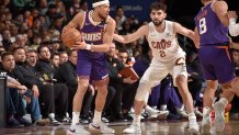 CLEVELAND, OH - JANUARY 20: Devin Booker #1 of the Phoenix Suns handles the ball during the game against the Cleveland Cavaliers on January 20, 2025 at Rocket Mortgage FieldHouse in Cleveland, Ohio. NOTE TO USER: User expressly acknowledges and agrees that, by downloading and/or using this Photograph, user is consenting to the terms and conditions of the Getty Images License Agreement. Mandatory Copyright Notice: Copyright 2025 NBAE (Photo by David Liam Kyle/NBAE via Getty Images)