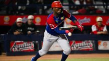 MEXICALI, MEXICO - FEBRUARY 07: Junior Lake of the Leones del Escogido of Dominican Republic at bat in the first inning during the game between Dominican Republic and Mexico as part of the Serie Del Caribe 2025 at Estadio El Nido De Los Aguila on February 07, 2025 in Mexicali, Mexico. (Photo by Miguel Rodriguez/Getty Images)