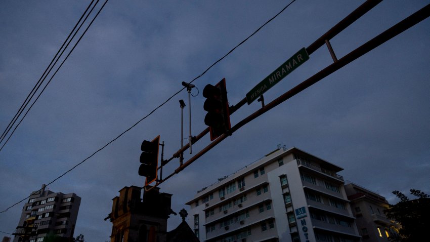 An intersection without stop lights is seen in the dark in San Juan, Puerto Rico after a major power outage hit the island on December 31, 2024. A major power outage plunged much of Puerto Rico into darkness Tuesday, with the US island territory’s electric utility saying restoration could take up to two days. The “island-wide blackout” began at 5:30 am (0930 GMT), Luma Energy said in a social media statement. (Photo by Ricardo ARDUENGO / AFP) (Photo by RICARDO ARDUENGO/AFP via Getty Images)