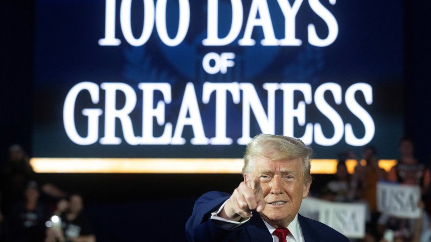 US President Donald Trump arrives to deliver a speech marking his 100th day in office at Macomb County Community College Sports Expo Center in Warren, Michigan, on April 29, 2025. Trump celebrated the first 100 days of what is already one of the most radical and far-reaching presidencies in US history, but polls show Americans becoming disenchanted with the economic and political tumult. (Photo by Jim WATSON / AFP) (Photo by JIM WATSON/AFP via Getty Images)