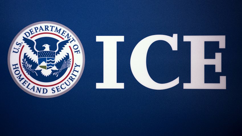 The Immigration and Customs Enforcement (ICE) seal is seen before a press conference discussing ongoing enforcement efforts to combat human smuggling along the Southwest border of the United States, July 22, 2014 at  ICE headquarters in Washington, DC.    AFP Photo/Paul J. Richards (Photo by Paul J. RICHARDS / AFP) (Photo by PAUL J. RICHARDS/AFP via Getty Images)