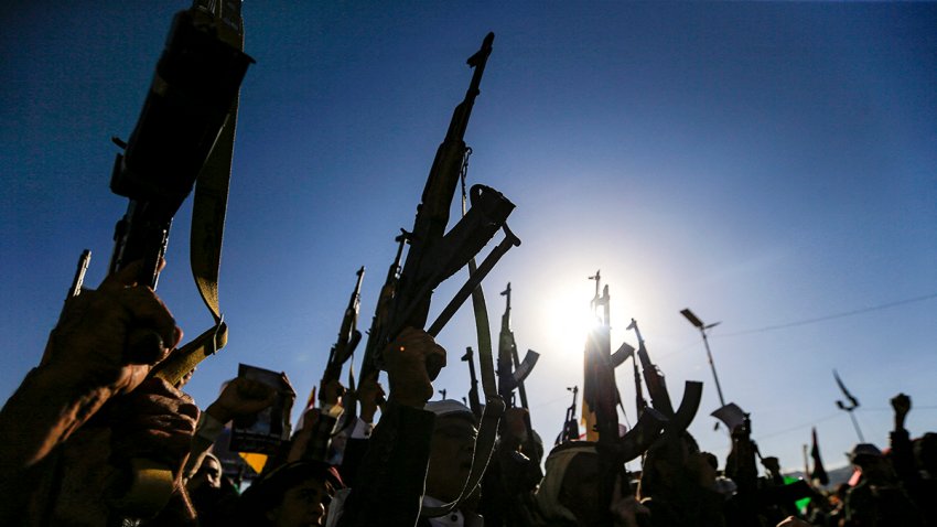 Supporters of Yemen’s Huthis gather with pictures of Hamas’ slain leader Yahya Sinwar during a rally held in the Huthi-controlled capital Sanaa on October 18, 2024 in protest against Israel’s attacks on Lebanon and the ongoing war between Israel and Hamas militants in the Gaza Strip. Israel announced on October 17 the killing of Sinwar, mastermind of the October 7 attack, calling his death a “heavy blow” to the Palestinian group it has been fighting for more than a year. (Photo by Mohammed HUWAIS / AFP) (Photo by MOHAMMED HUWAIS/AFP via Getty Images)