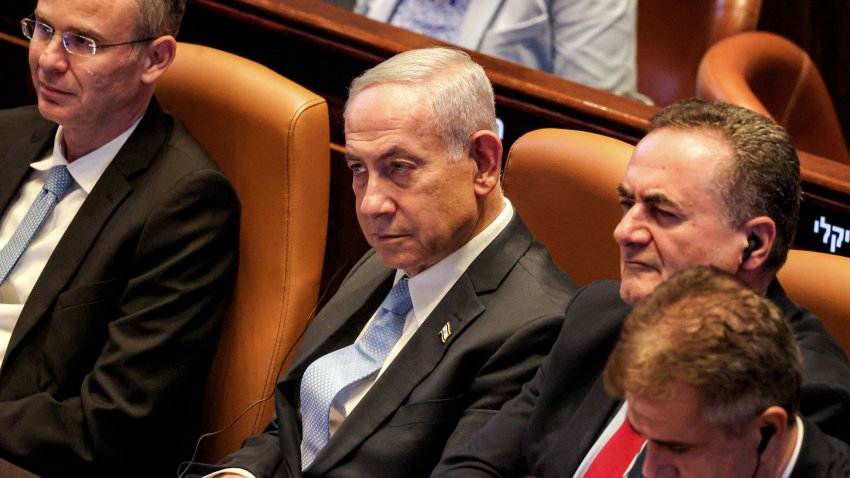 Israel’s (L to R) Justice Minister Yariv Levin, Prime Minister Benjamin Netanyahu, Defence Minister Israel Katz, and Energy and Infrastructure Minister Eli Cohen attend the address of Argentina’s President to a session of the Israeli parliament (Knesset) at its headquarters in Jerusalem on June 11, 2025. (Photo by Menahem KAHANA / AFP) (Photo by MENAHEM KAHANA/AFP via Getty Images)