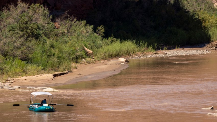 MEXICAN HAT, UT – SEPTEMBER 6: A lone rafter floats down the San Juan River, a trip that takes several days to reach Halls Landing on Lake Powell, on September 6, 2022 near Mexican Hat, Utah. The federal government has proposed an unprecedented plan to cut back on water supplies from the Colorado River for Arizona, Nevada and California, where millions of people rely on the river for water and power. Climate change-driven drought continues to lower water levels at Lake Powell, the second biggest reservoir in the nation, to historically low levels. (Photo by David McNew/Getty Images)